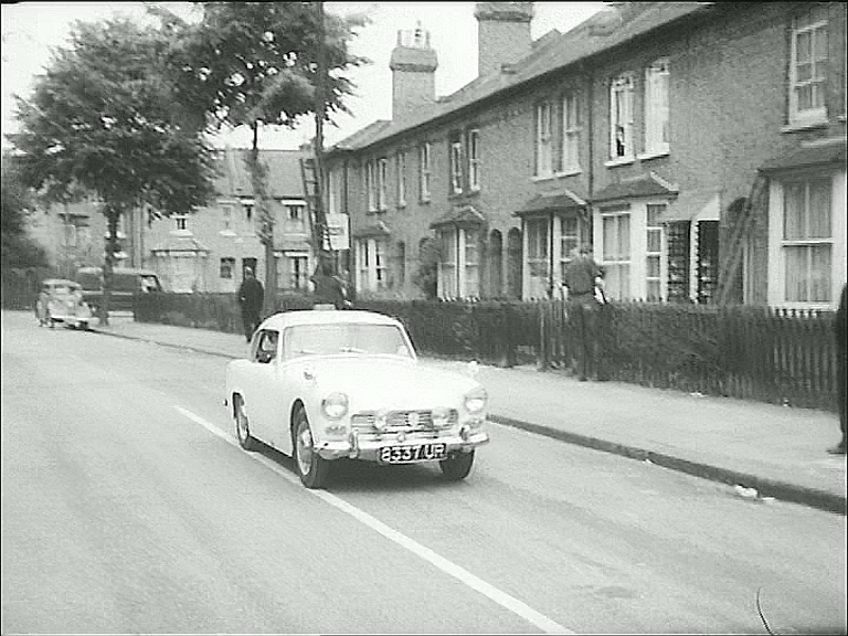 Teddington Park Road with properties on Wick Road in the top left background. Circa 1962