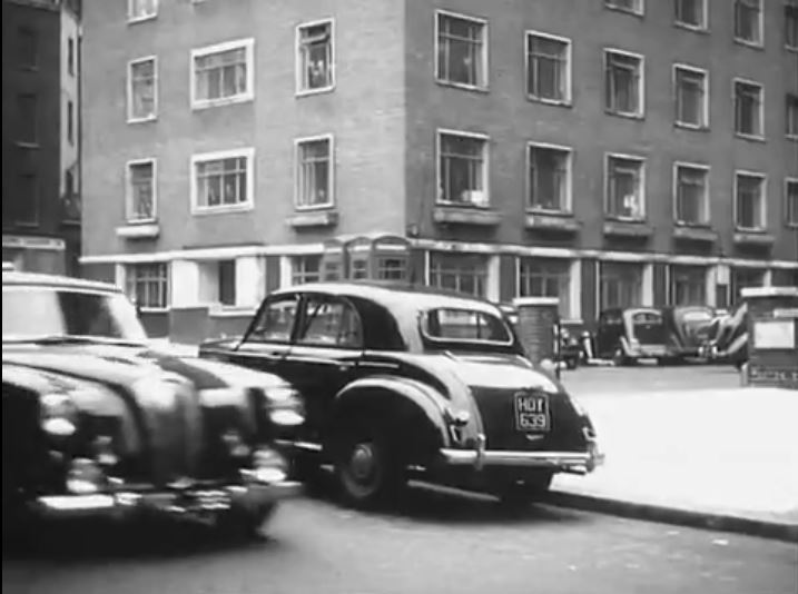 St. Giles High Street in London WC2 with the western part of St. Giles Court filling the background Circa 1954