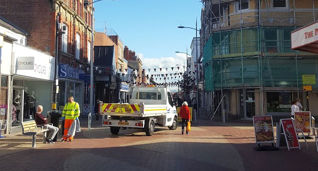 The now pedestrianised High Street with the corner of Sussex Street to the right. Rhyl, Denbighshire (formerly Flintshire)