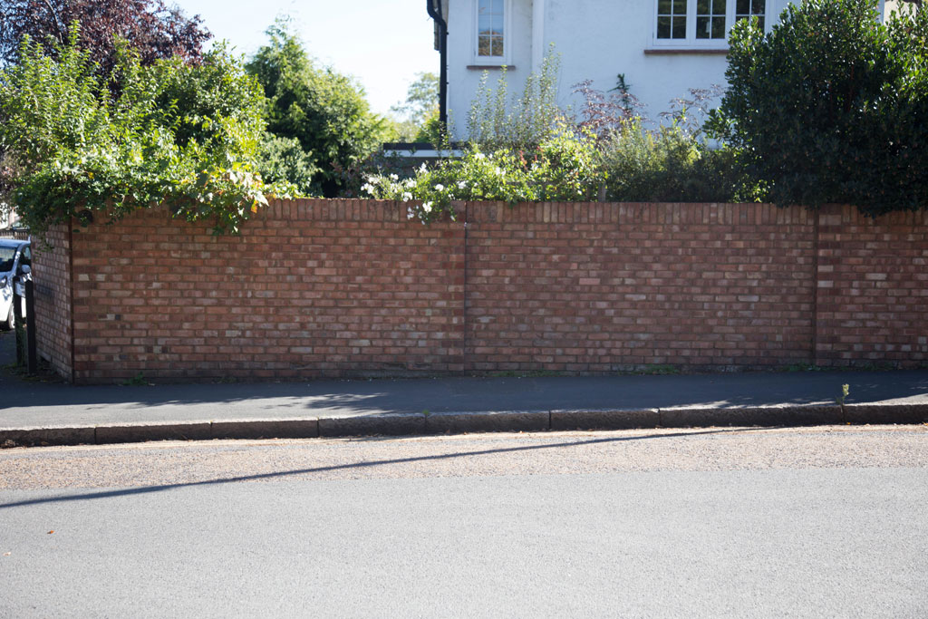 Churchfield Road towards Sidney Road in Walton-on-Thames, Surrey.