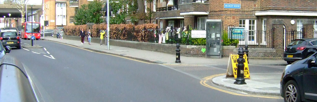 The view north along Bramley Road, W10.