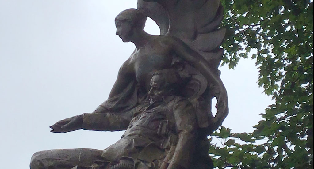 The Angel & Soldier statue, part of the War Memorial on Trinity Street in Stalybridge, Greater Manchester.