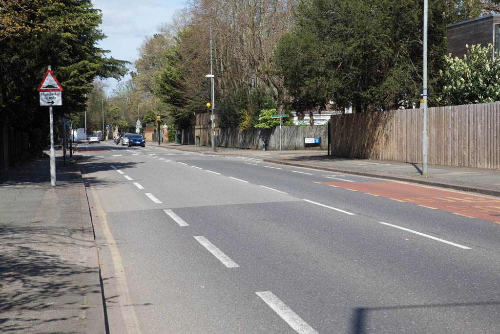 An "A" road looking towards advancing traffic and a road off to the right.