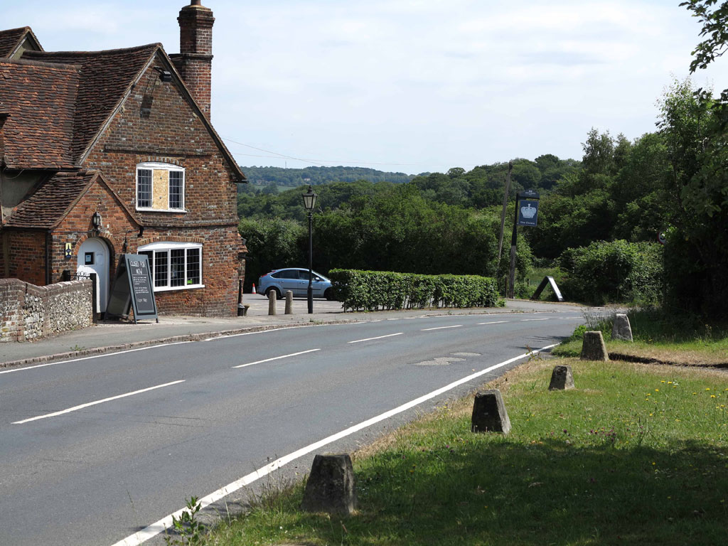 Church Road, Penn, Bucks and The Crown public house to the left