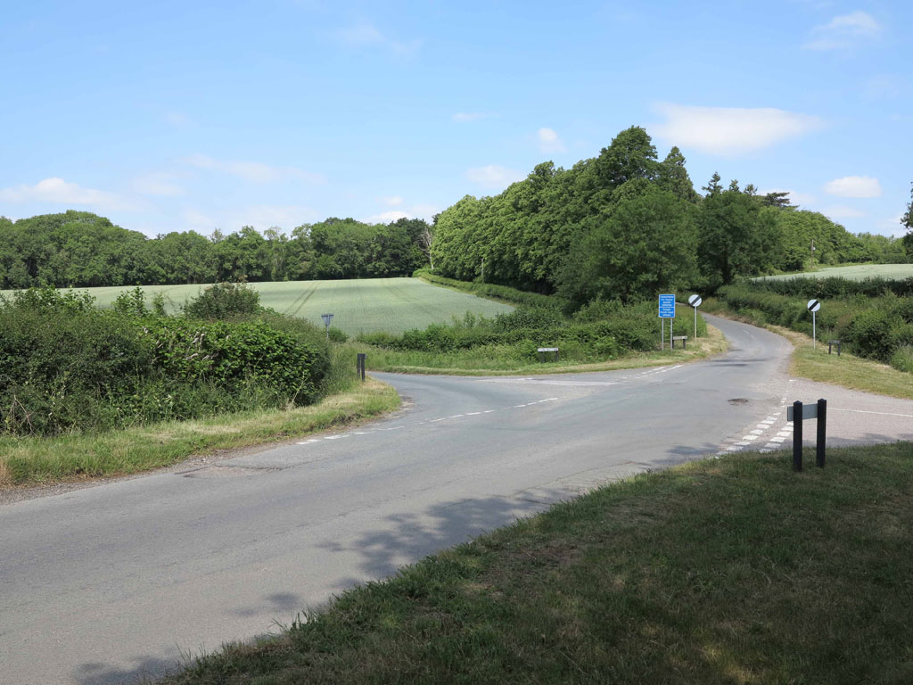 Clay Street at Penn near Amersham in Buckinghamshire with the car coming out of Penn Bottom