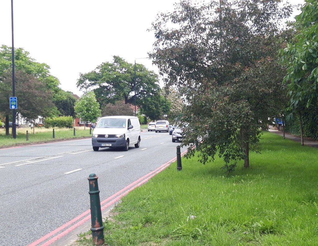 A316 Twickenham besides All Hallows church, opposite Marlow Crescent.