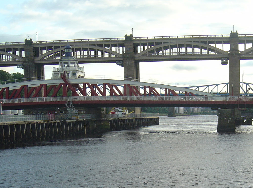 The River Tyne with the dual deck road and rail High Level Bridge crossing the scene.