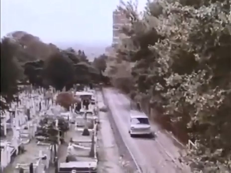Looking south along Holly Walk in Hampstead, London NW3 with the tower of Hampstead Parish Church in the top distance. Circa 1968