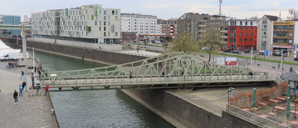 Malakoff Swing Bridge at the entrance of Rheinau harbour in Cologne with Am Leystapel to the right.