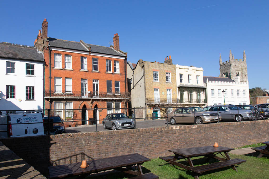 Church Street in Isleworth and All Saints Church to the right.
