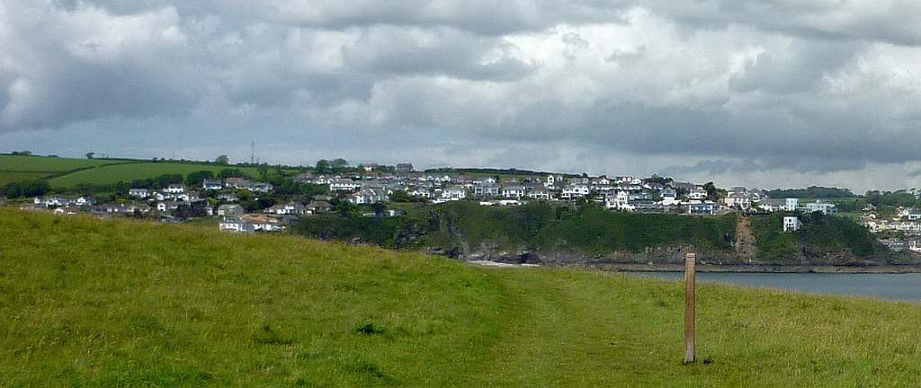 Mevagissey Harbour is behind at the far right.