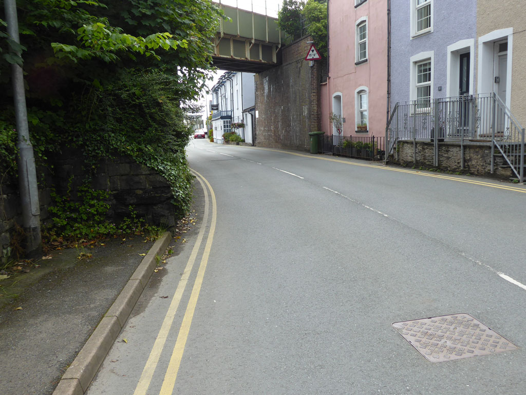 Terrance Road with the railway bridge framing more of Penhelig village.