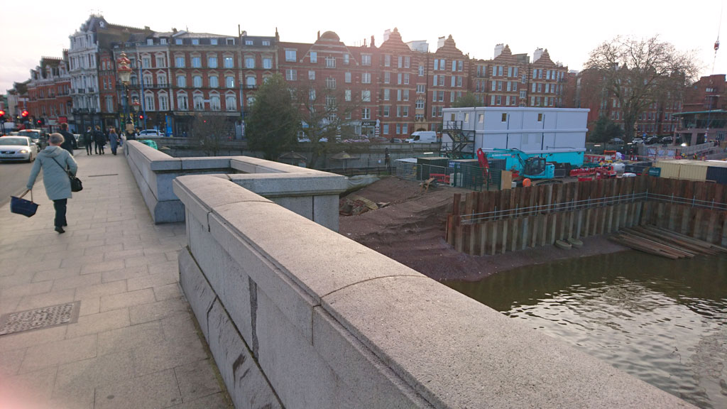 Looking southward on Putney Bridge with properties on Lower Richmond Road in the background.