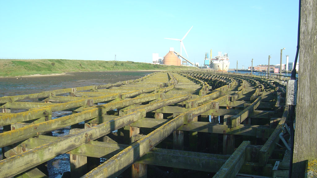 Looking south along the River Blyth in Northumberland with Blyth town centre in the right distance.