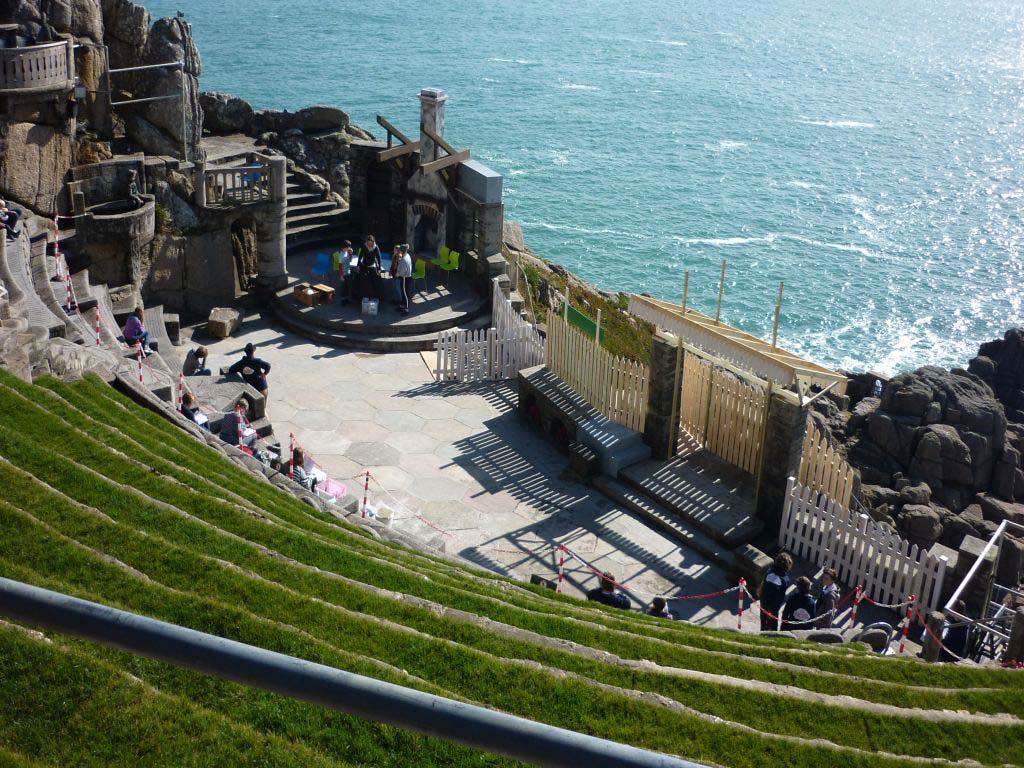 Looking down onto a coastal amphitheatre and the sea beyond