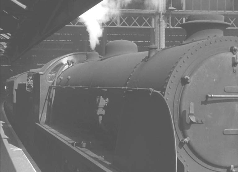 A LSWR/SR H15 Class 4-6-0 No 476 leaving Waterloo Station.