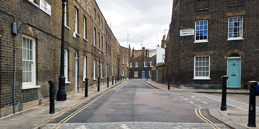 Facing south on Theed Street in Lambeth with Whittlesey Street to the right and Roupell Street in the distance.