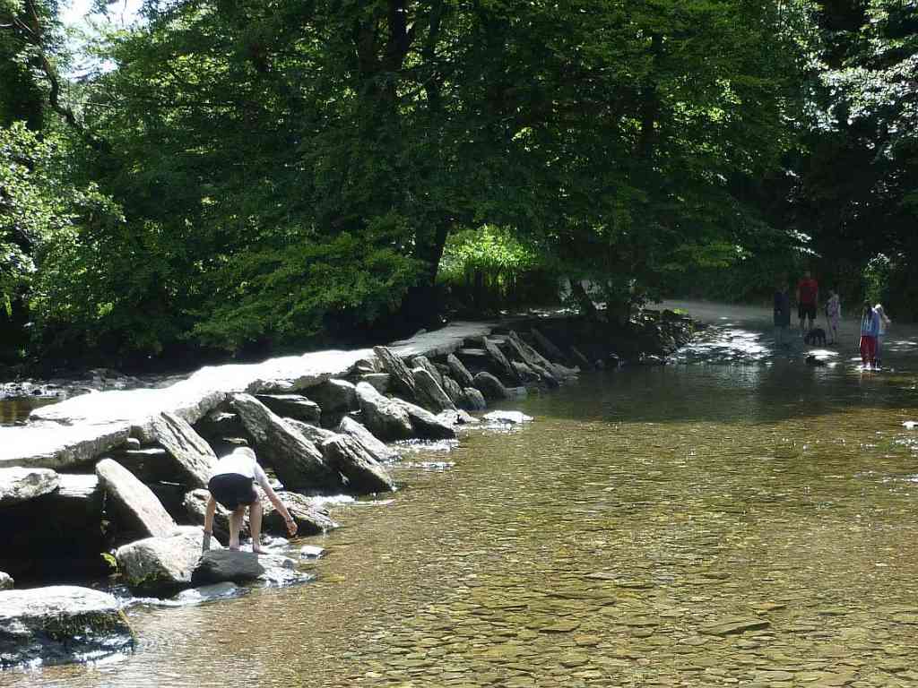 Tarr Steps where the river Barle is crossed by an ancient clapper bridge four miles north west of Dulverton.