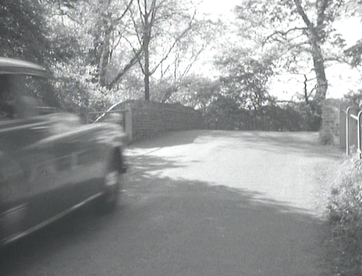 Cranford Lane just at the border of Cranford and Harlington and the bridge over the River Crane. Circa 1957