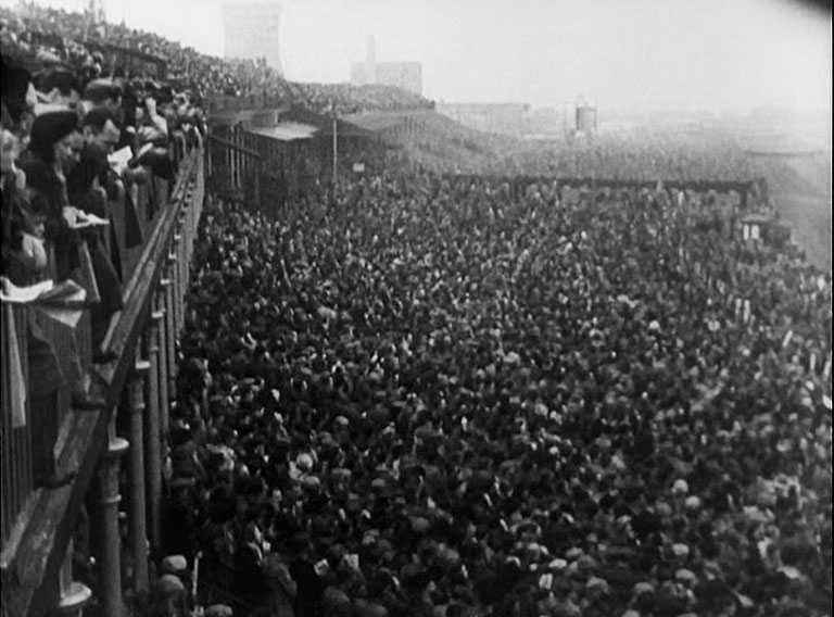 An overview of the grandstand at Aintree during a Grand National Day