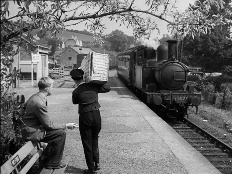 The single platform at Staverton Station looking towards the level crossing gates Circa 1950