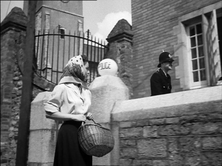 St Lawrence Lane, Ashburton, Devon with St Lawrence Chapel in the background. Circa 1950