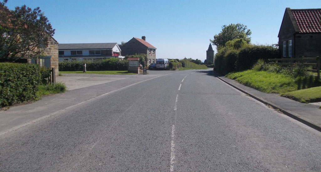 High Street in Lythe with St. Oswald’s church in the right distance.