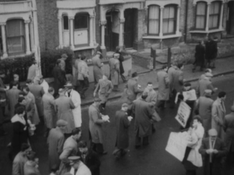 Gillespie Road, London N5 Circa 1960 and football crowds.
