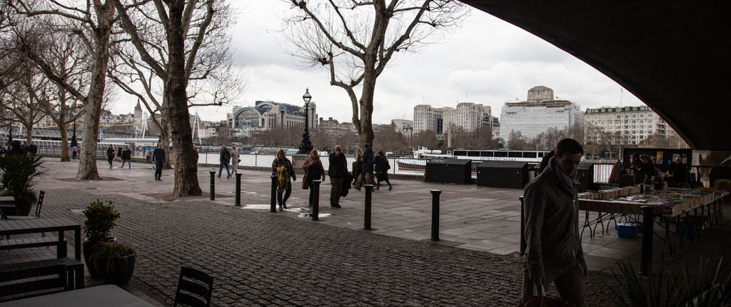 Beneath Waterloo Bridge in SE1 with the Savoy Hotel’s clock tower silhouetted in the right distance.