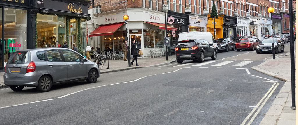 Hampstead High Street NW3 with the corner of Oriel Place to the left.