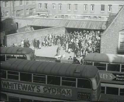 Welwyn Street in Bethnal Green E2, and the terrace of Gawber Street beyond the playground of Globe Primary School. Circa 1940