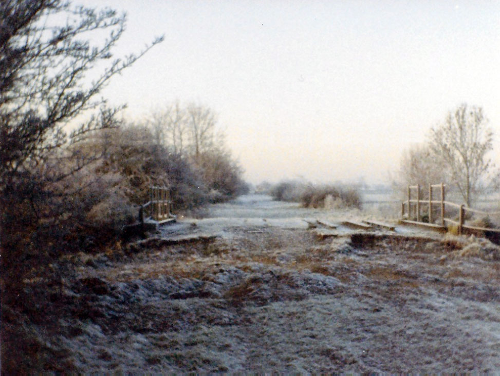 The view along the old railway bed at Partington Bridge