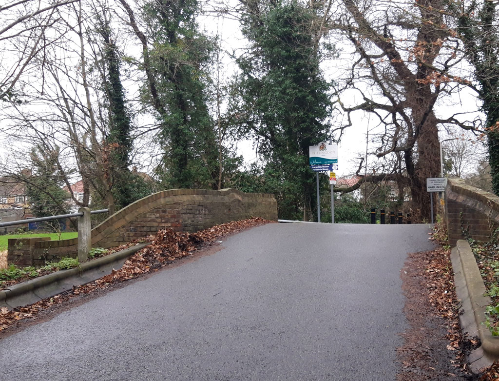 Cranford Lane just at the border of Cranford and Harlington and the bridge over the River Crane.