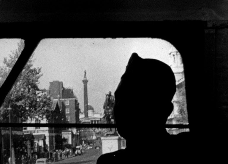 Whitehall looking towards Trafalgar Square and Nelson on his column and the statue of Earl Haig on horseback. Circa 1960