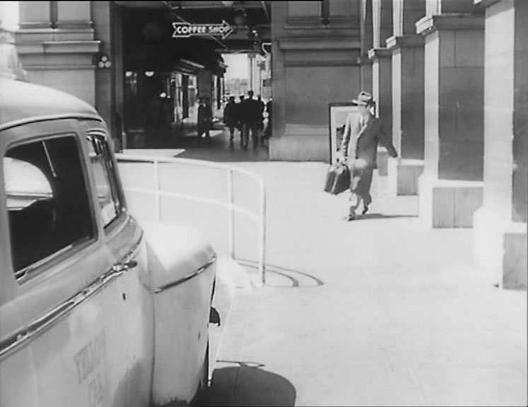 Marty exits the terminal building. Ferry Building, San Francisco.