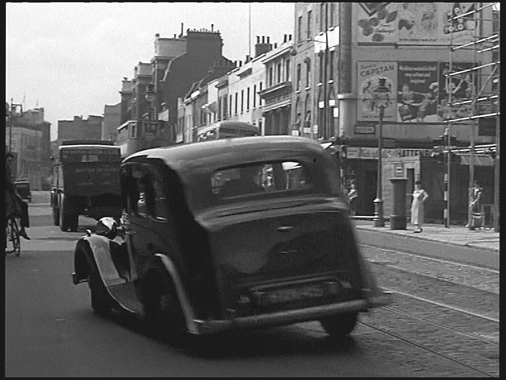 Vauxhall Bridge Road with Rochester Row running off to the right. Circa 1952