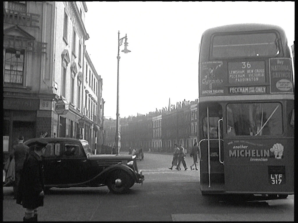 Tachbrook Street as a police car starts to exit from Charlwood Street from the left. The ‘Enterprise’ public house is on the corner behind the car. Circa 1952