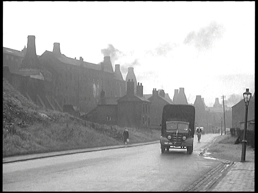 Sutherland Road, Longton, Stoke-on-Trent, Staffordshire looking northeast just prior to Paragon Road, they are pulling into what is now the driveway to the left of ‘Adderley Works’. Circa 1952
