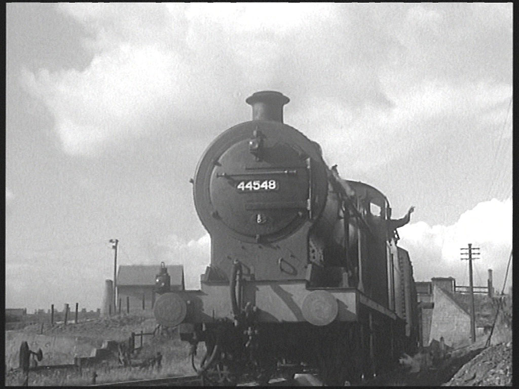 Potteries Loop Line that linked Stoke with Kidsgrove on the stretch of line between Cobridge and Burslem stations and we are here looking in the direction of Burslem. Circa 1952