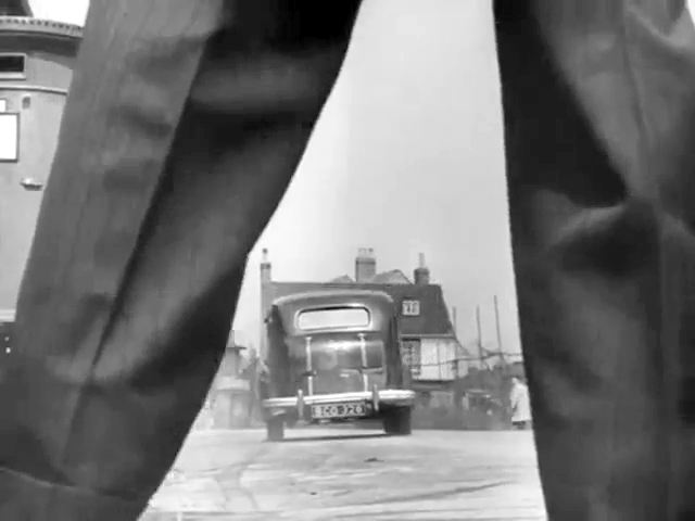 Looking along Crisp Road towards the Cannon public house on Queen Caroline Street in Hammersmith W6. Circa 1948
