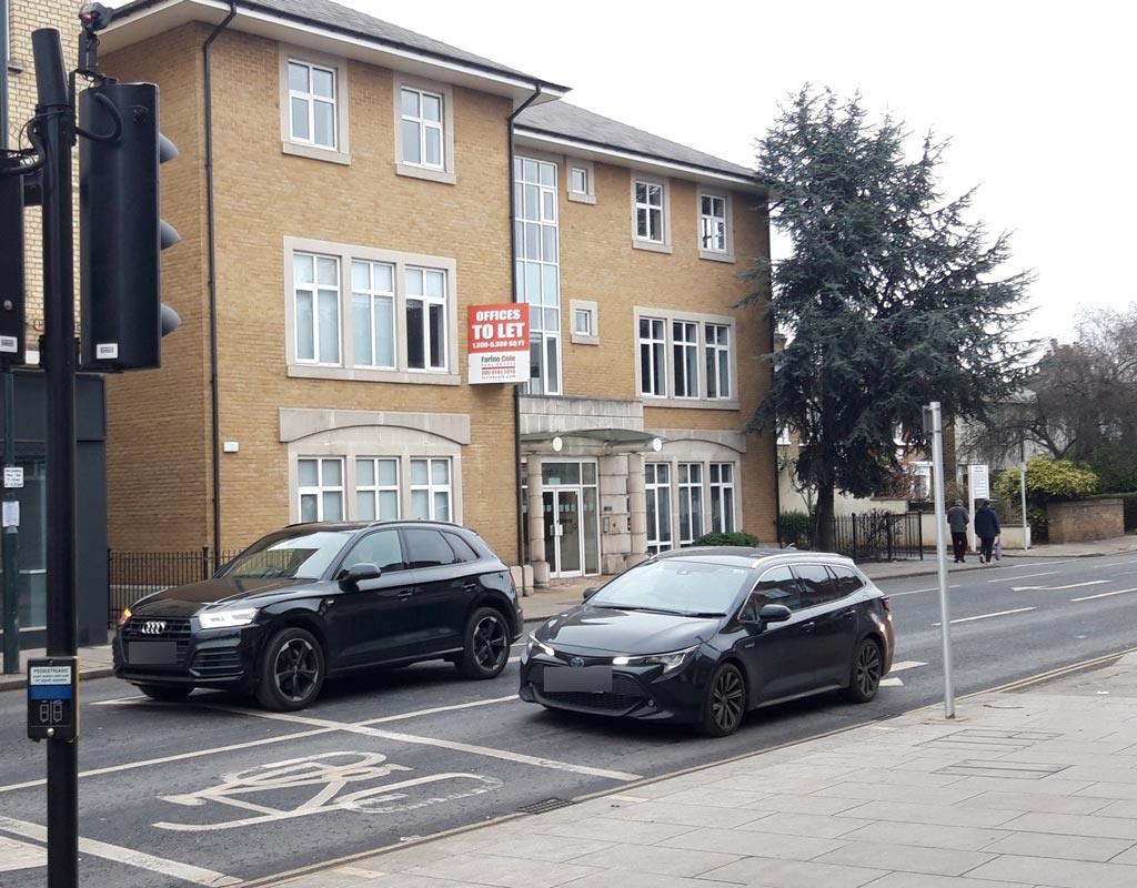 High Street, Hampton Hill, Middlesex at the junction with Hampton Road.