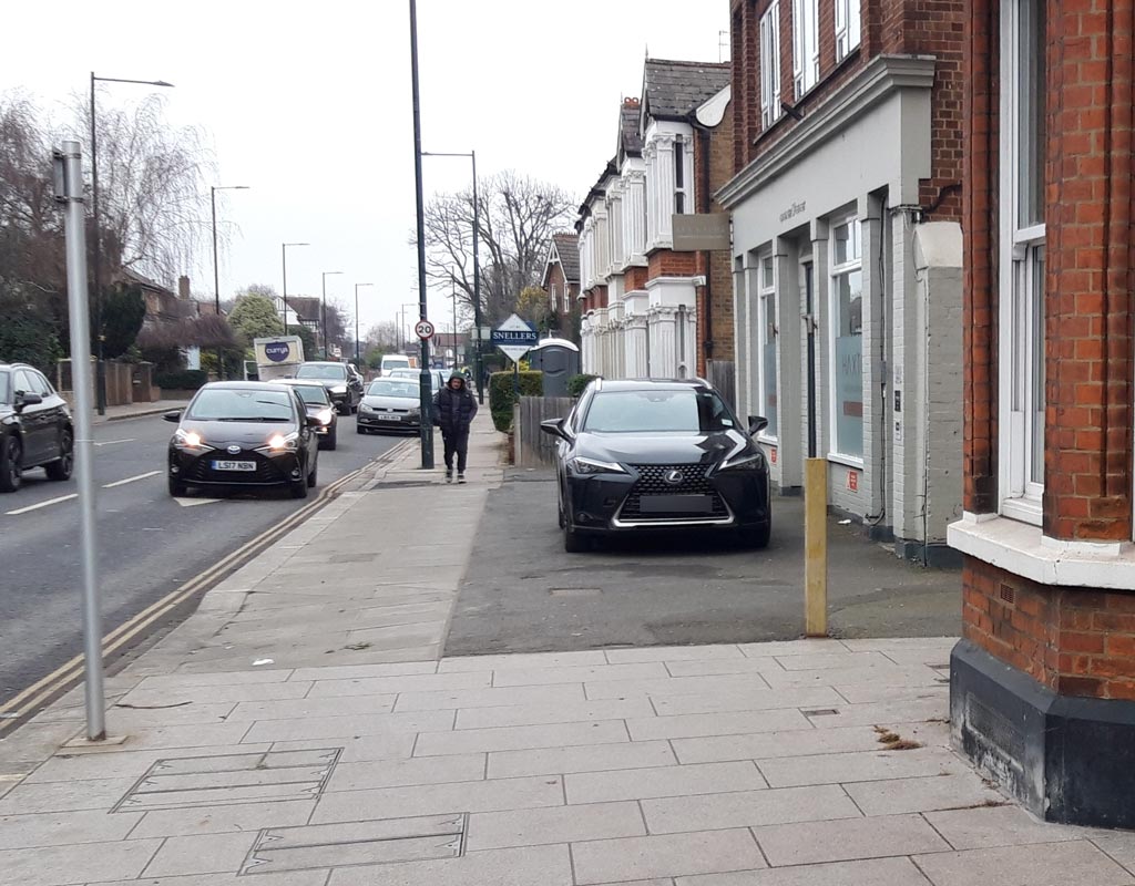 Beside 120 High Street, Hampton Hill in Middlesex.