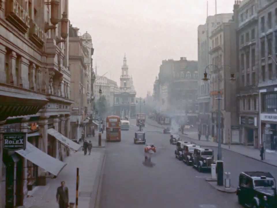 Strand, London WC2 and St Mary Le Strand Church center. Circa 1955