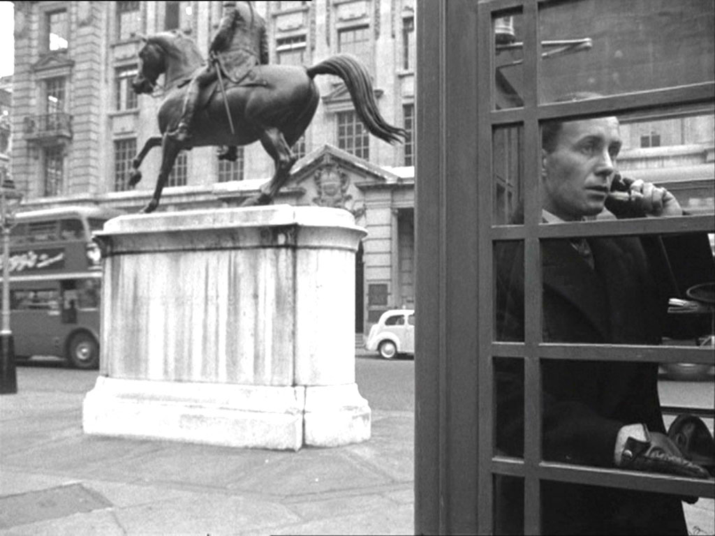 The corner of Cockspur Street and Pall Mall East, London SW1 with the statue of King George lll. Circa 1956