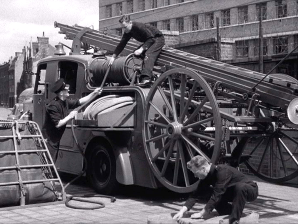 Lambeth High Street premises in the background. Circa 1942