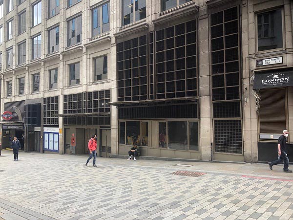 Fish Street Hill, London EC3 with the entrance to Monument station on the left.