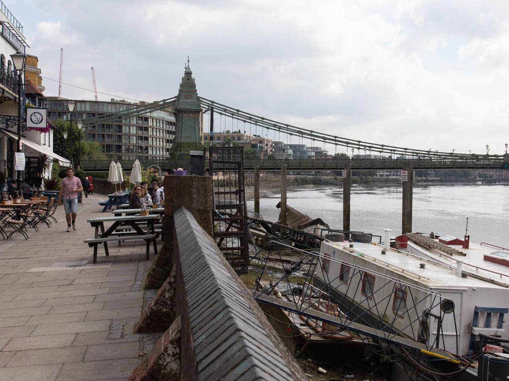 Looking east along Lower Mall towards Hammersmith Bridge with the 'Rutland Arms' to the left.