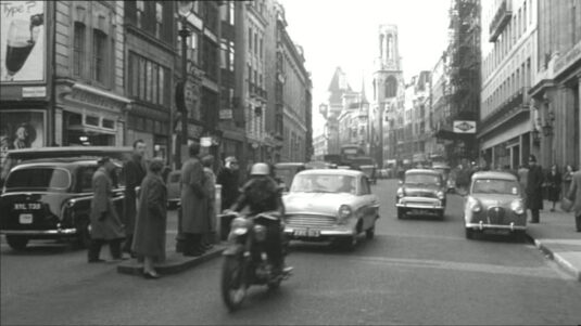 Fleet Street, London EC4. Looking west with Bouverie Street off to the left. Circa 1960