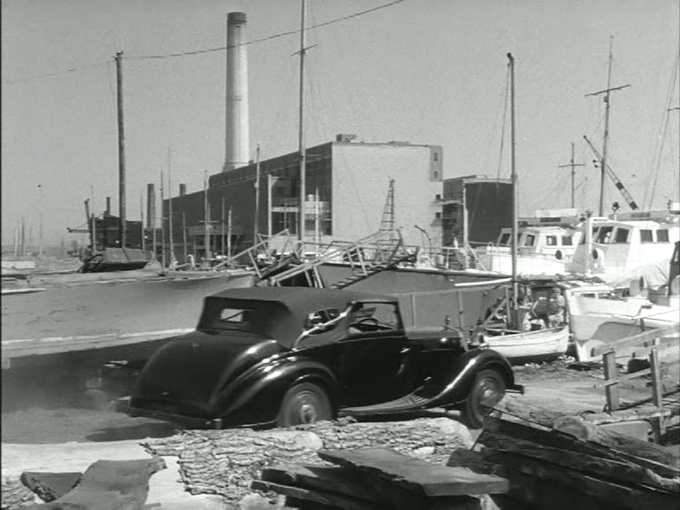Shoreham Harbour and Brighton 'B' Power station and the chimneys of 'A' station in the background. Circa 1954