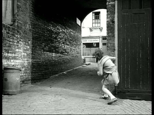 ‘West Mews’ located off West Warwick Place, Pimlico SW1. Looking northeast towards left from the corner of 4 West Warwick Place. Circa 1958